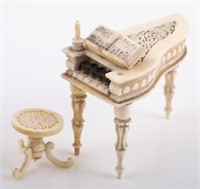 CARVED BONE MINIATURE PIANO WITH PIANO STOOL
