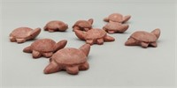 SEVERAL 1.5 INCH STONE TURTLES