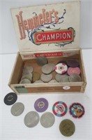 Cigar box filled with gaming tokens and casino