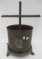 Antique cast iron fruit press.