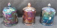 (3) Carnival glass lidded biscuit jars. Measures: