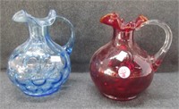 (2) Glass vases with ruffled edge. Blue vase