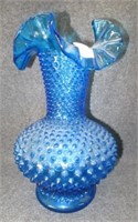 Blue Hobnail Fenton vase. Measures: 10" tall.