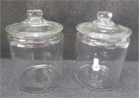 (2) Lidded canisters. Measures: 8.5" tall.