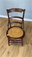 Vintage wooden chair with wicker seat 34.5’’ tall