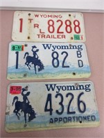 Three Wyoming License Plates