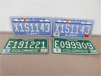 Four Colorado License Plates