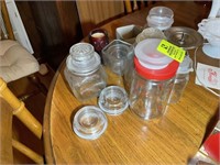 GROUP OF GLASS JARS WITH LIDS AND MORE