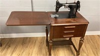 Antique White Sewing Machine in cabinet, patent