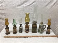 7 COLLECTABLE OIL LAMPS