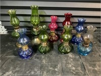 9 UNIQUELY COLORED GLASS OIL LAMPS