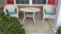 Cast iron table & wicker chairs