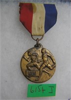 One mile relay runner's award medal and ribbon