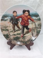 Rolling Hoops by Kee Fung Ng collector's plate