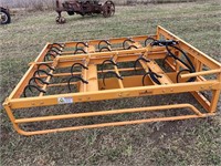 LandHoner  10 bale hay accumulator skid loader
