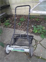 Rotary push lawn mower with bag