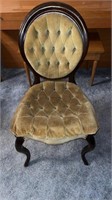 Old green diamond tucked chair