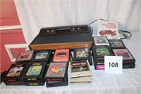 ATARI GAME SYSTEM WITH 26 GAMES AND CONTROLLERS