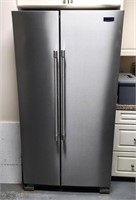 stainless Maytag side x side refrigerator freezer