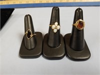 3  GOLD RINGS W/ STONES MARKED 10K