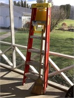 Werner 6’ step ladder and a broom