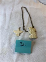 Two carved pendants #32
