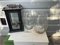 Three glass candles holders