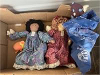Two dolls and a couple bandannas