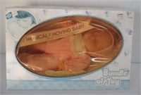 Bundle of Joy musical moving doll in box.