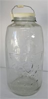 19" Tall mason jar. Note: Plastic on bail handle