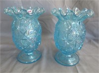 Pair of opalescent blue Fenton vases. Measures: 7"