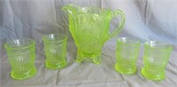 Vaseline pitcher measures 8" tall with (4)