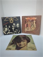 2 Vintage Aerosmith vinyl record albums and Lobo