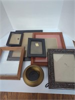 Lot of various sized picture frames and small