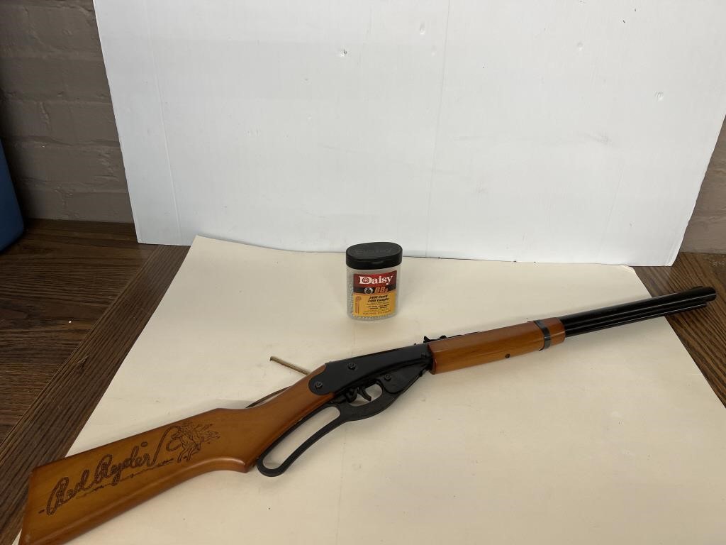 Vintage Red Ryder BB gun and Daisy BBs.