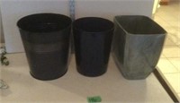 Assorted small trash cans