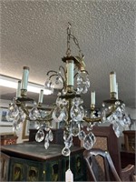 ORNATE BRASS AND CRYSTAL CHANDELIER