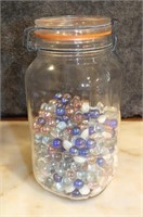JAR WITH GLASS BEADS & MARBLES