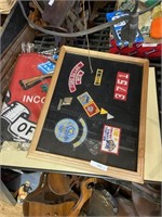 assorted patches and flag