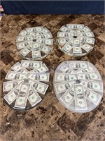 4 toilet lid covers dollar bills and half dollar