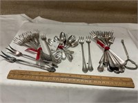 20 plated forks, 6 spoons, can opener