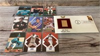 Joe Louis stamp and assortment of baseball cards