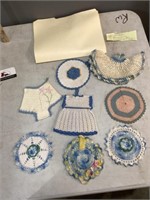 8 Crocheted blue and white potholders