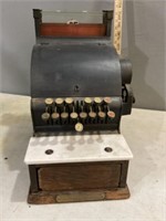Vintage cash register locked up
