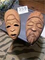2. E Paul wooden masks