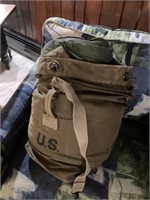 Military duffel bag with sleeping bag that has