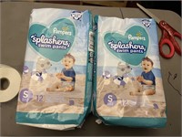 2 pampers splashers size small 12 count each