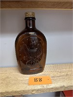 Vintage Amber Eagle Bottle Log Cabin
