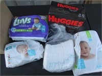 Lot of Various Sized Diapers, NEW Box