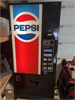 Vintage Pepsi machine, turns on and works.